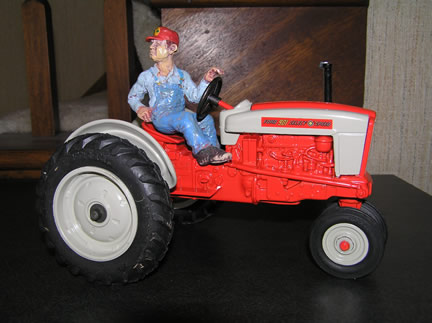 3092DO Jim Babcock with Ford 901 Tractor